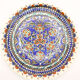 Turkish plate of Kutahya with floral and ethnic motifs