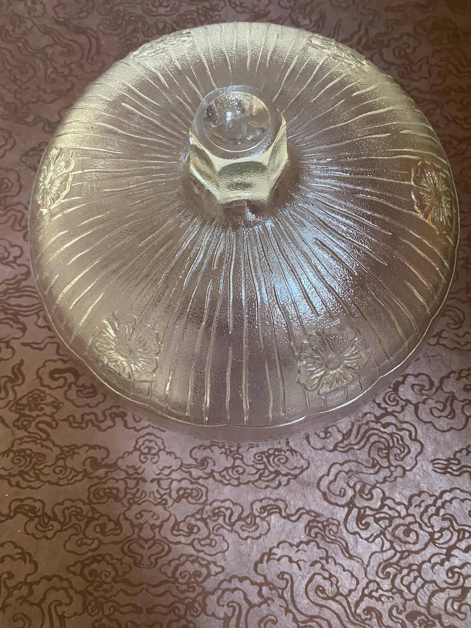 White glass bell. Floral patterns.