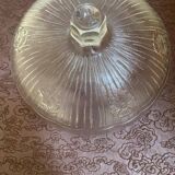 White glass bell. Floral patterns.