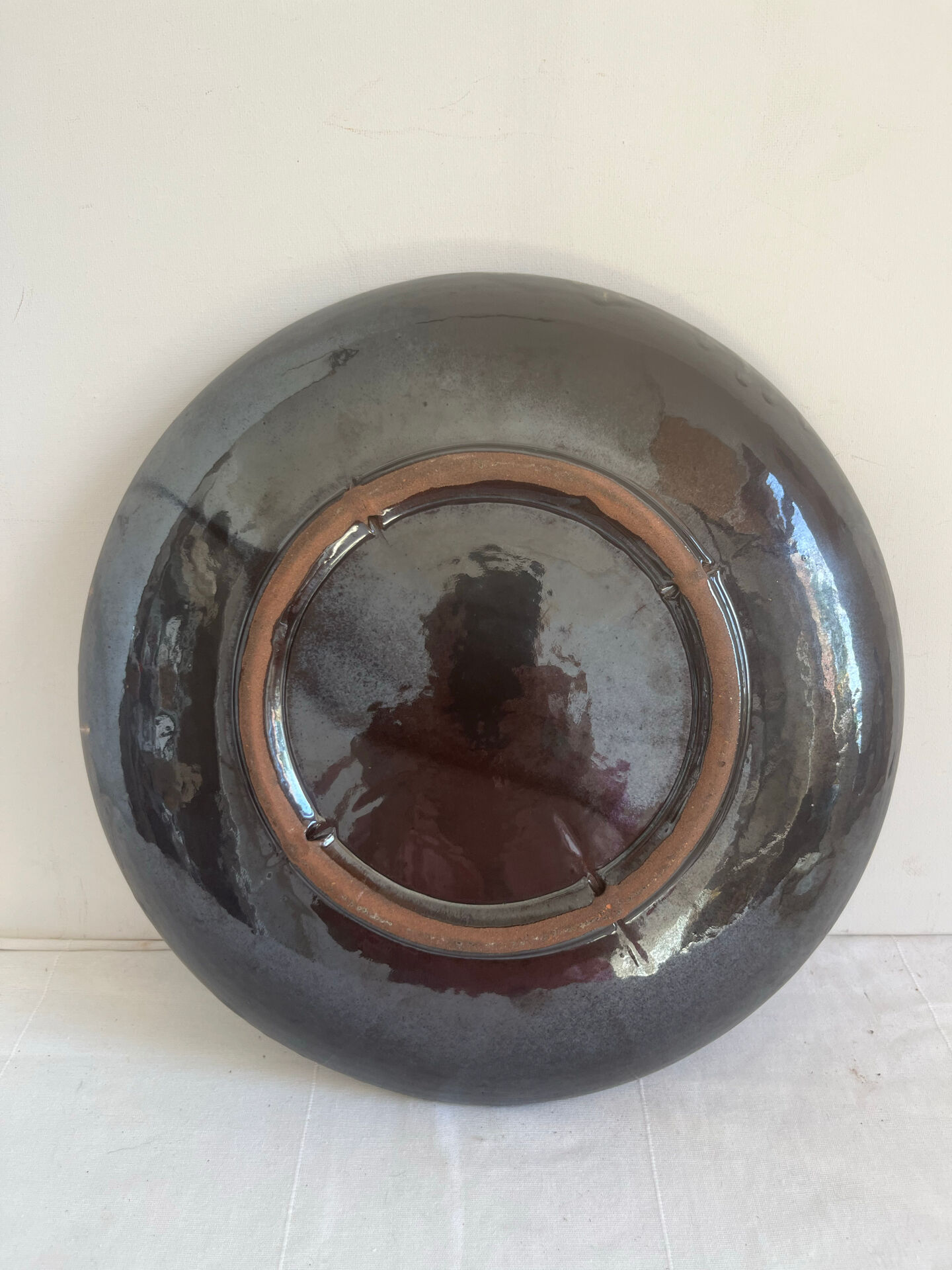 Vintage ceramic bowl for placing or hanging.