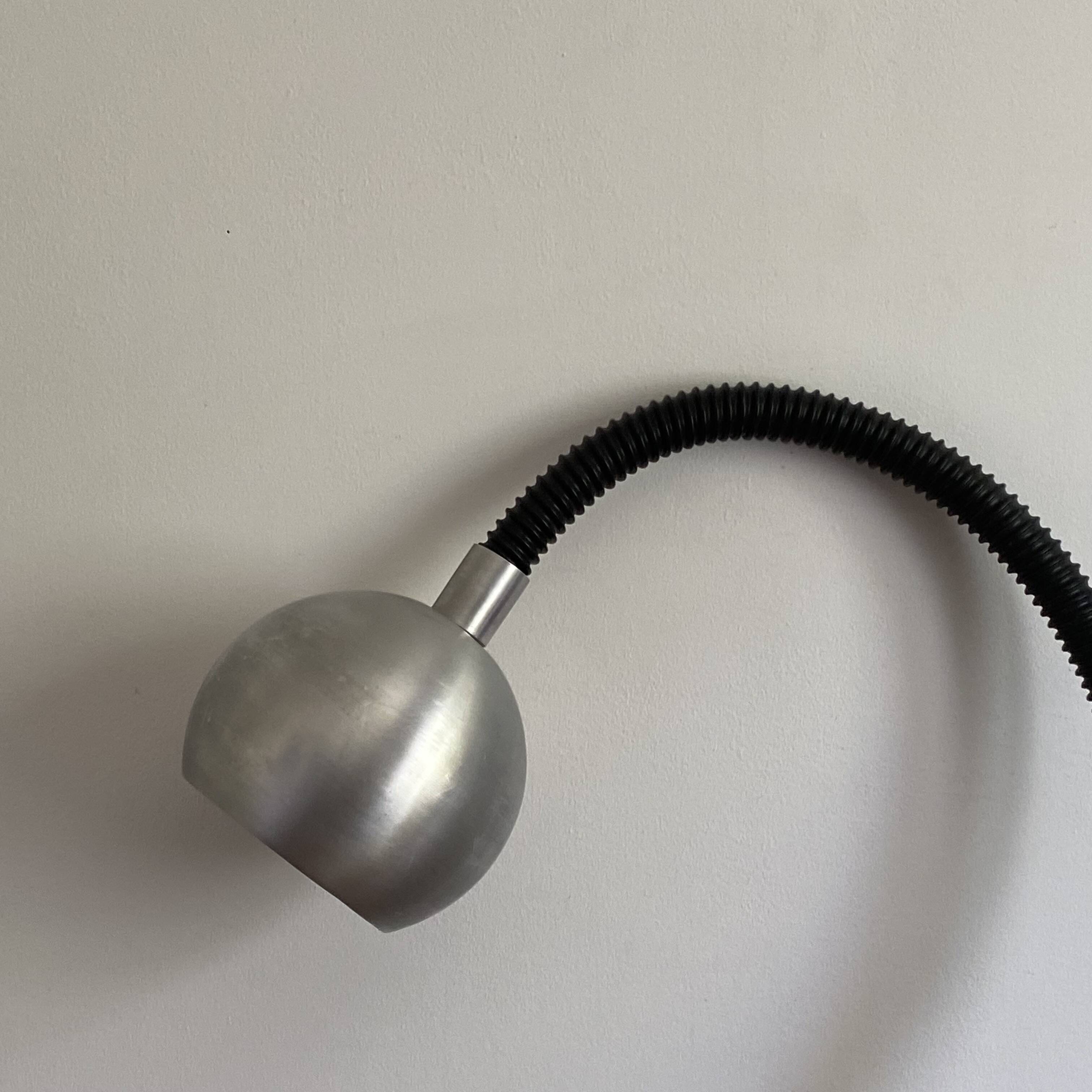 Flexible Eye ball wall light by RAAK. 1970. 65x55cm.