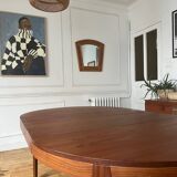 Round extendable rosewood table from the 70s