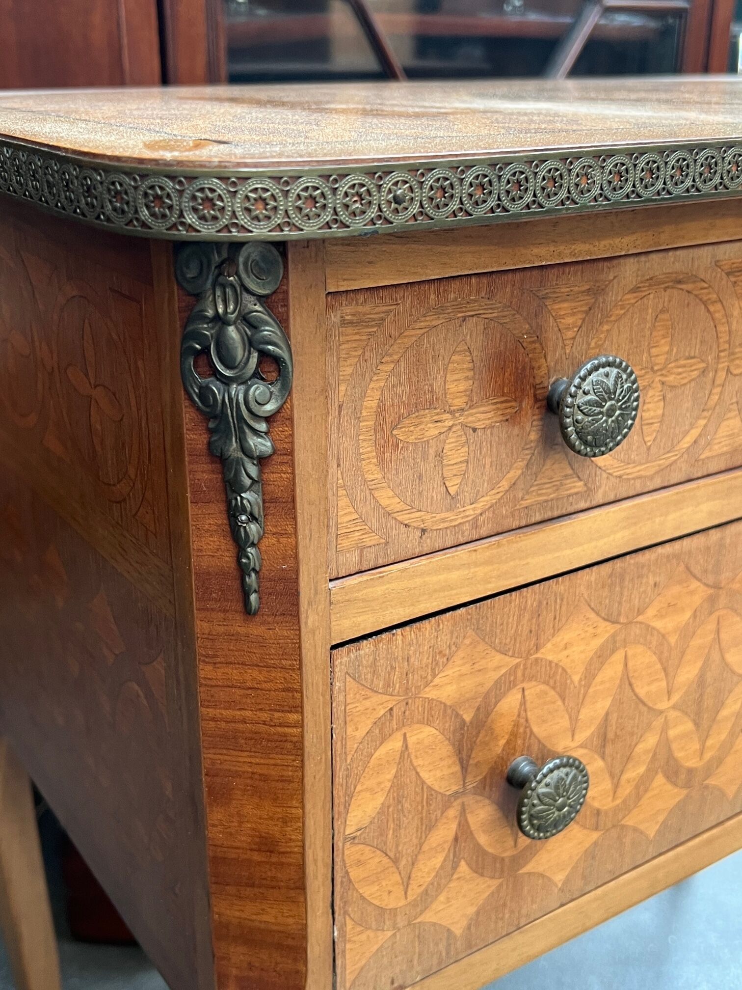 Louis XVI style chest of drawers with marquetry inlay