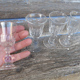 Set of 4 glasses with old feet for liquor