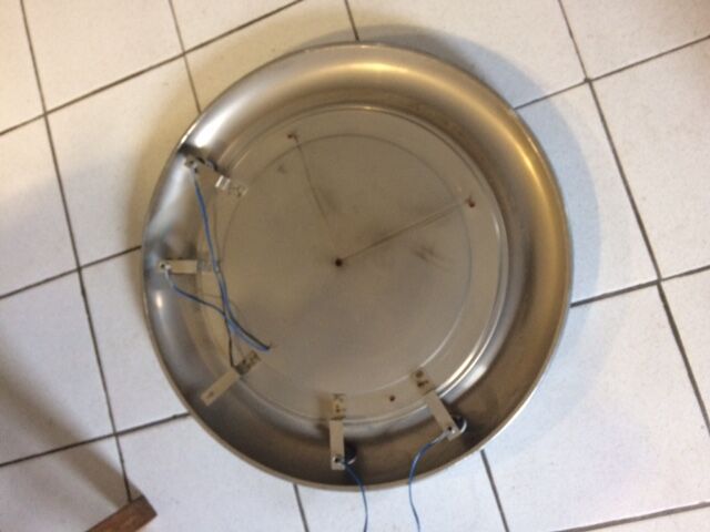 Vintage bright round bathroom mirror in metal