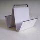 Metal magazine holder by Pete Sans for NRO