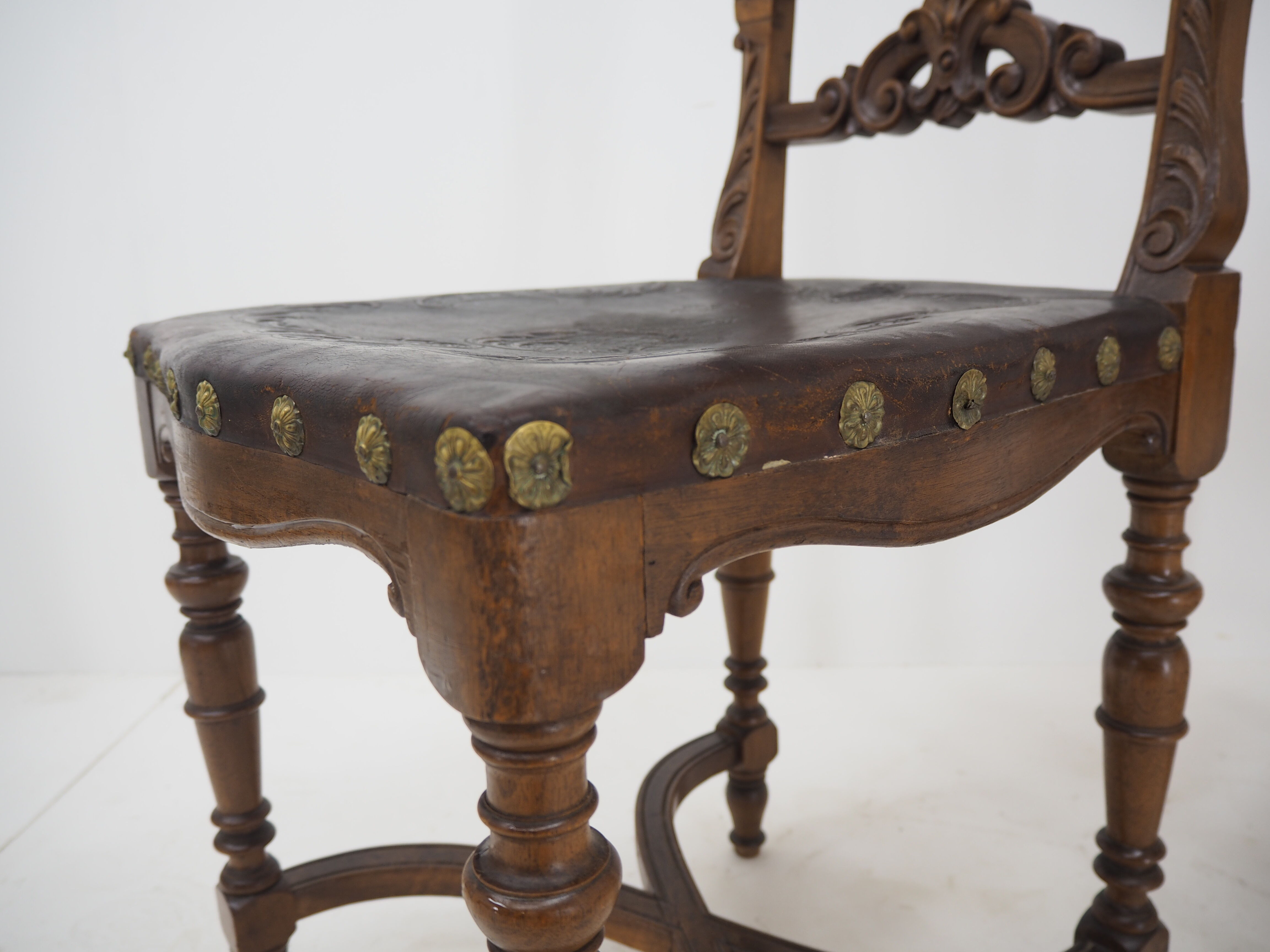 Pair of Antique Embossed Leather Chairs