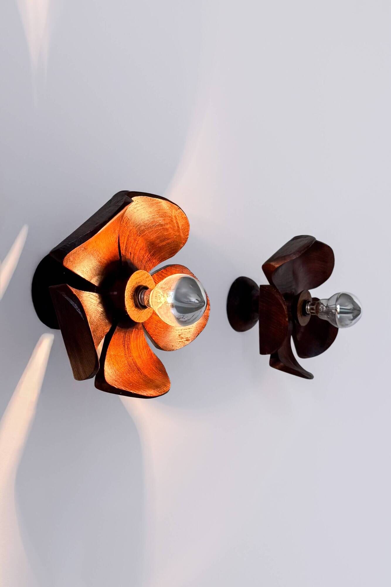 Vintage wall sconces, carved wood with floral pattern, France, 1960.