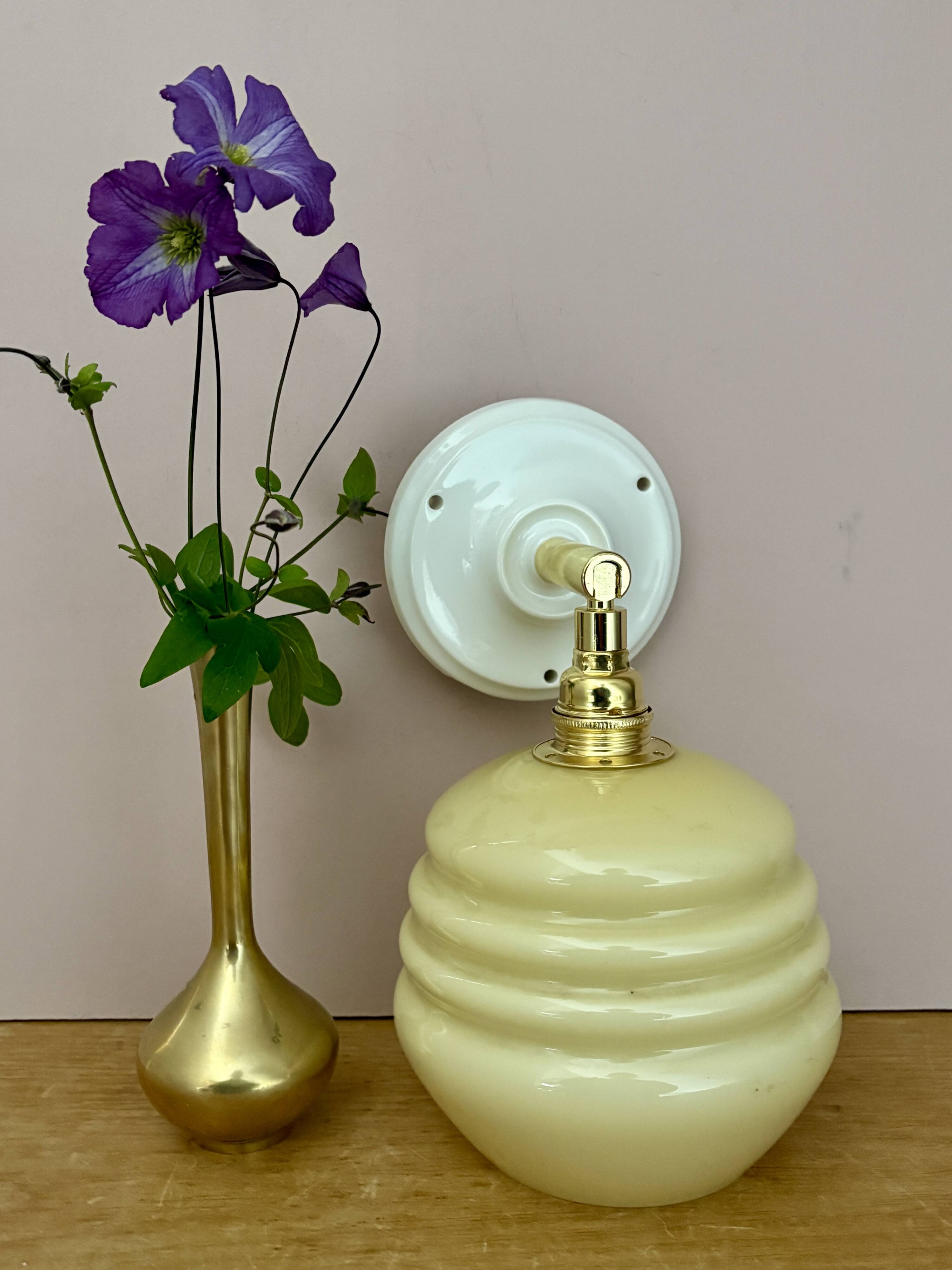 Vintage globe wall lamp in pale yellow opaline