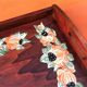 Rectangular wooden service tray with floral decoration