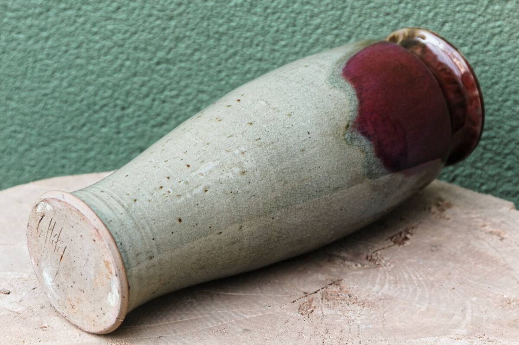 Glazed stoneware vase, signed, oxblood