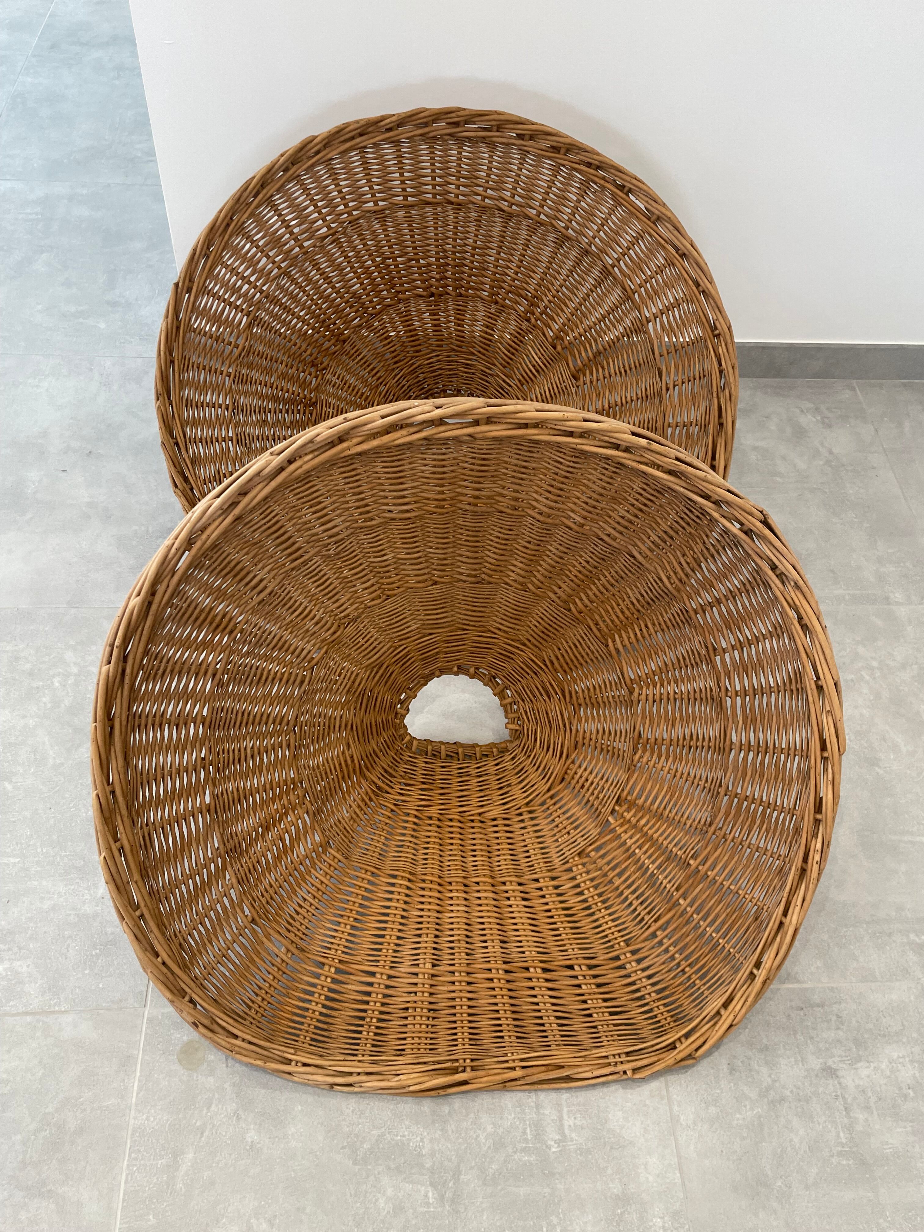 Pair of rattan and black metal armchairs, 1950s/60s