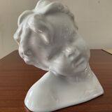 Cherub child bust in enamelled porcelain