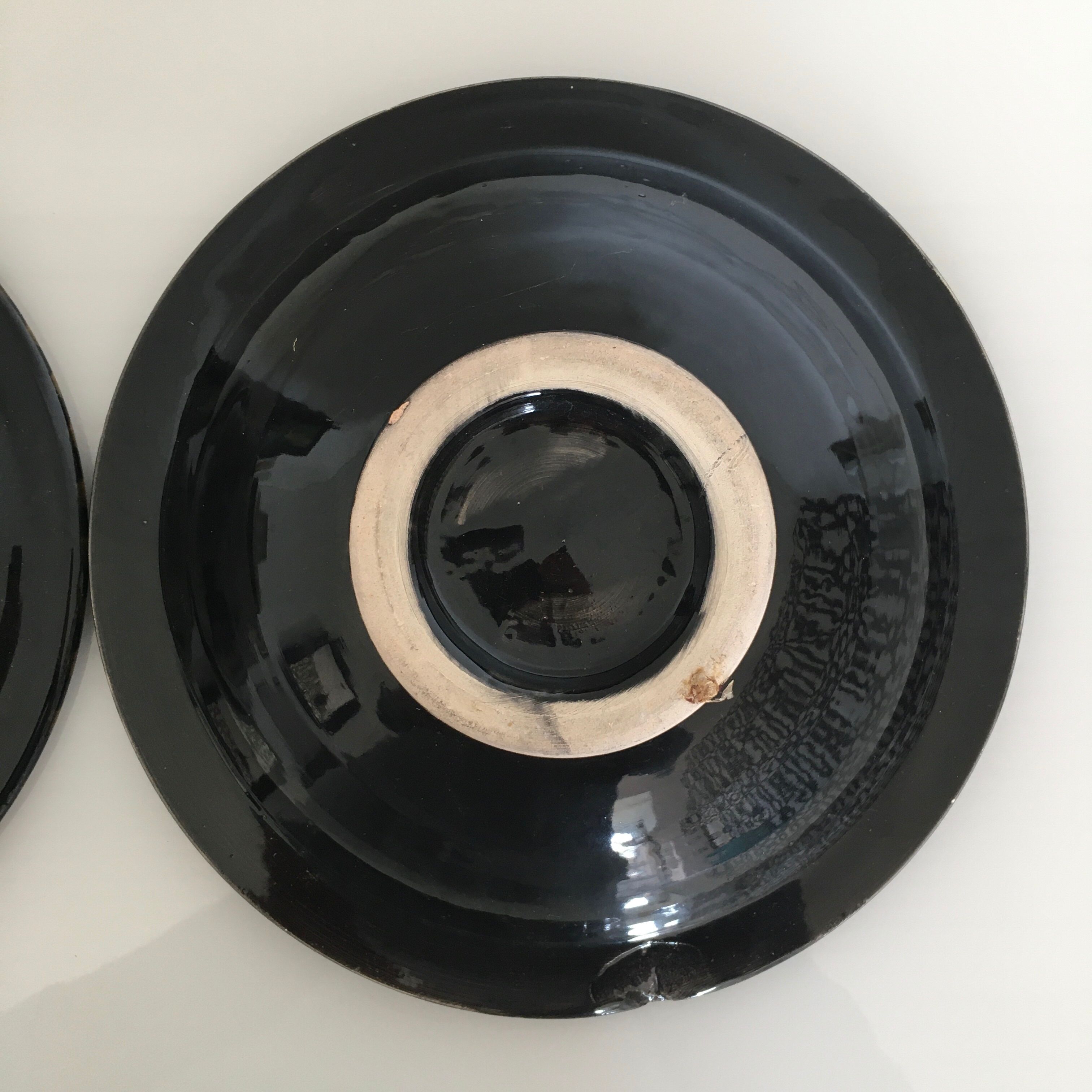 Set of 3 black decorative deep plates.