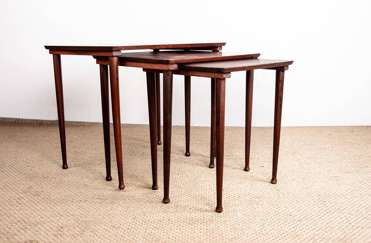 Three Danish nesting tables in rosewood by Mobelintersia 1960.
