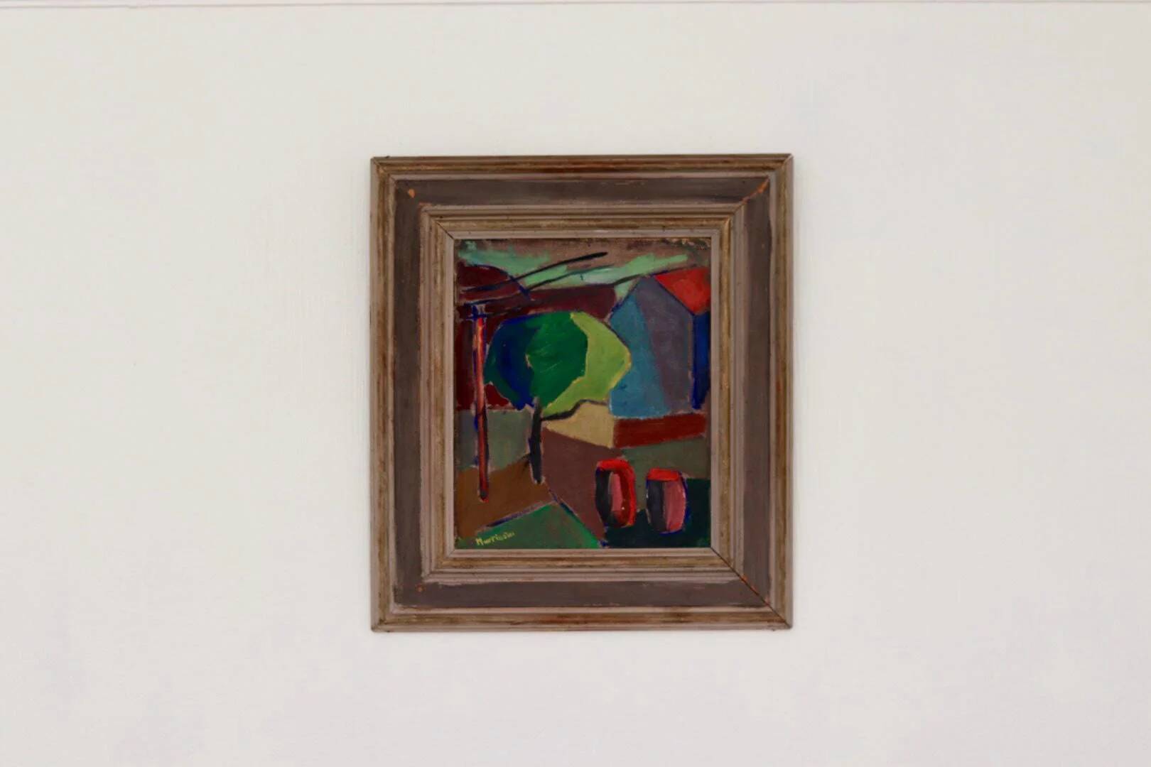 House obscured by a tree by Harry Martinson