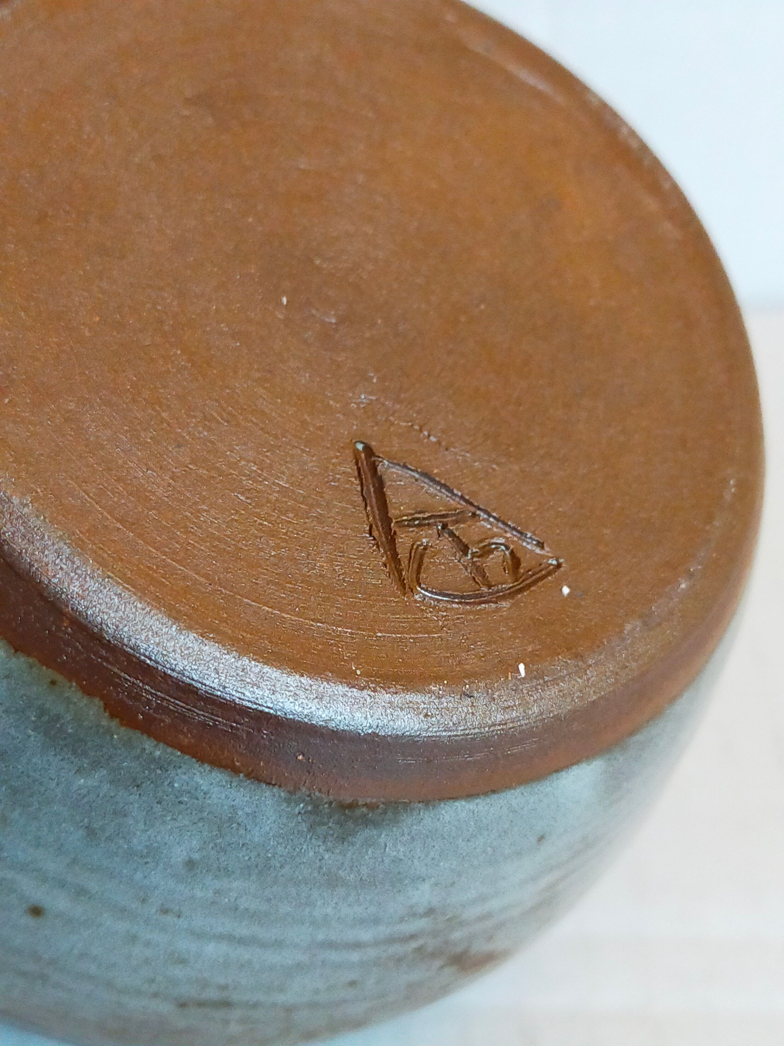 Duo of potter's pots covered in vintage glazed stoneware