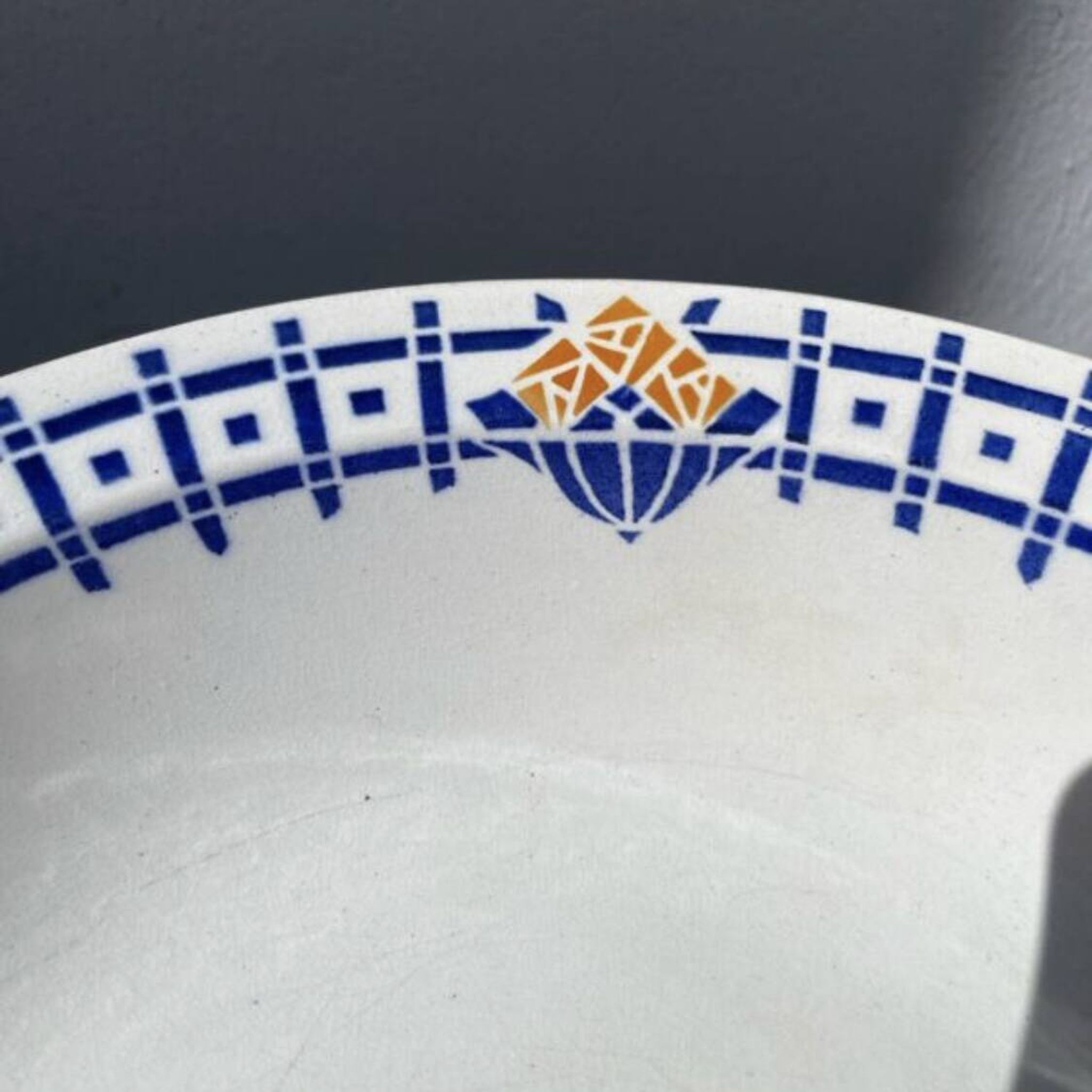 Round, shallow ceramic salad bowl from Saint Amand