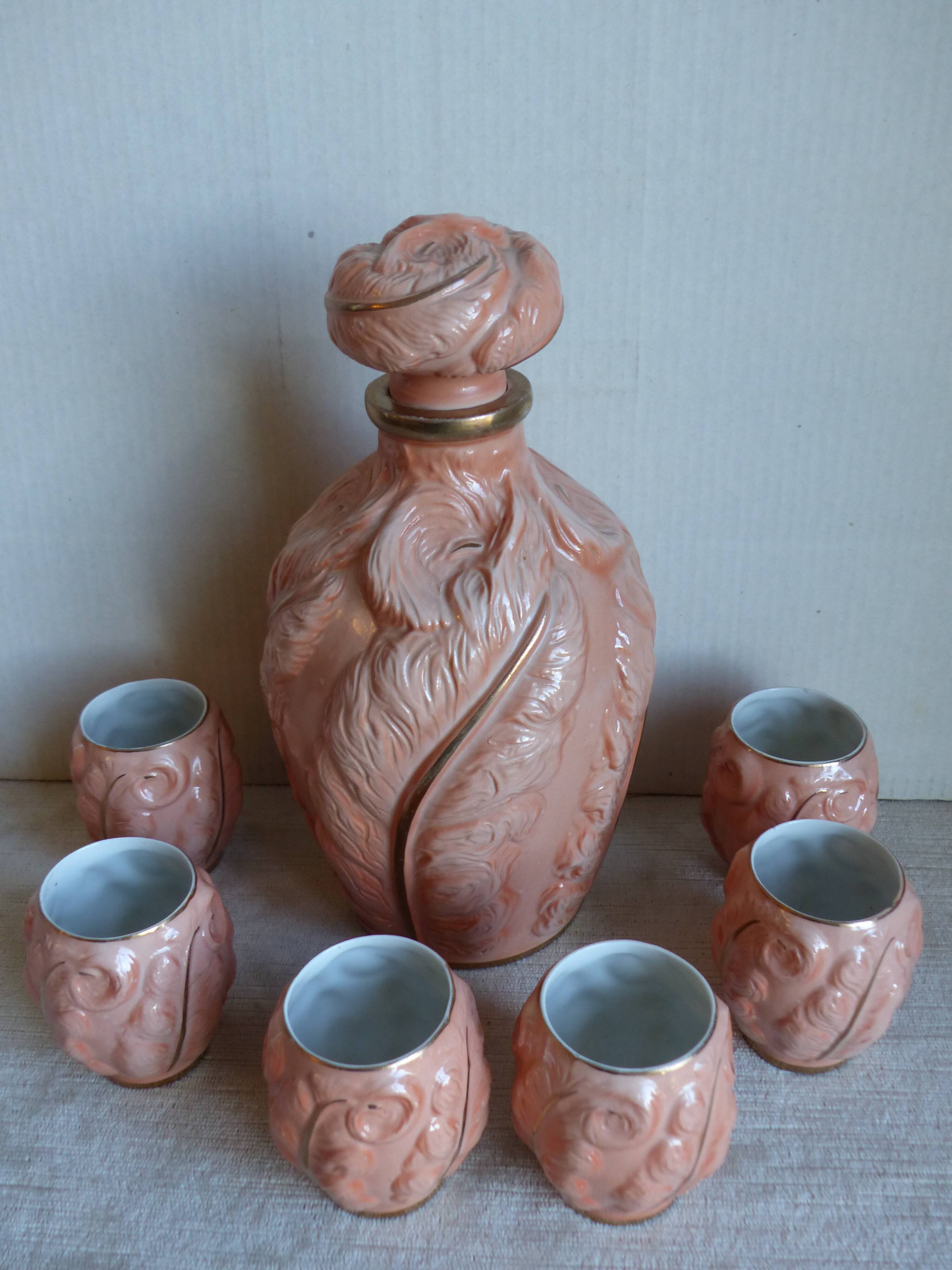 Bottle and six porcelain cups from Couleuvre