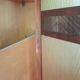 Large vintage wardrobe from the 50s/60s in wood with a mirror.
