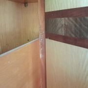 Large vintage wardrobe from the 50s/60s in wood with a mirror.