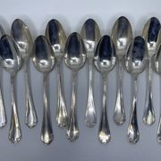 Set of 12 silver-plated soup spoons with Louis XV pattern.