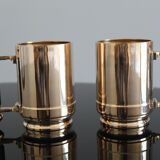 Pair of art deco bronze beer mugs France, 1940s, signed Bronze Star