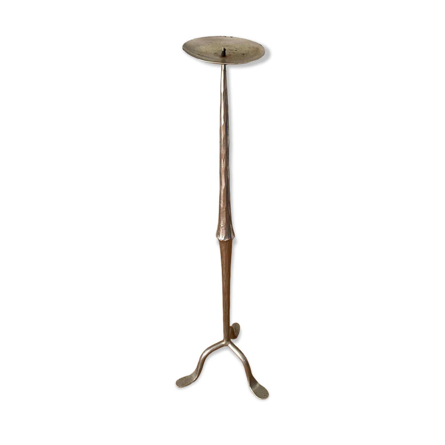 Large silver-plated candlestick on a stand