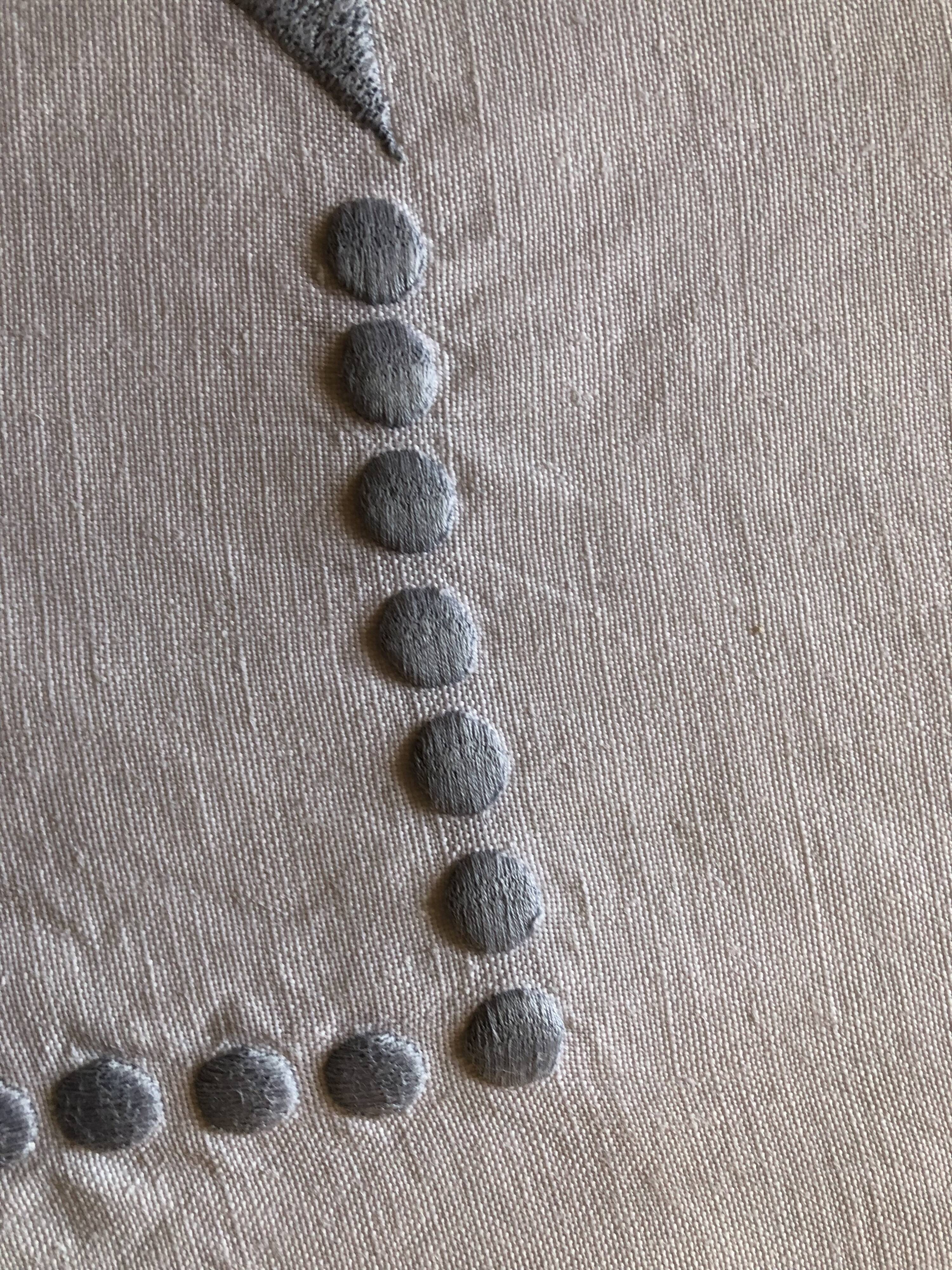 Embroidered linen tablecloth and six napkins