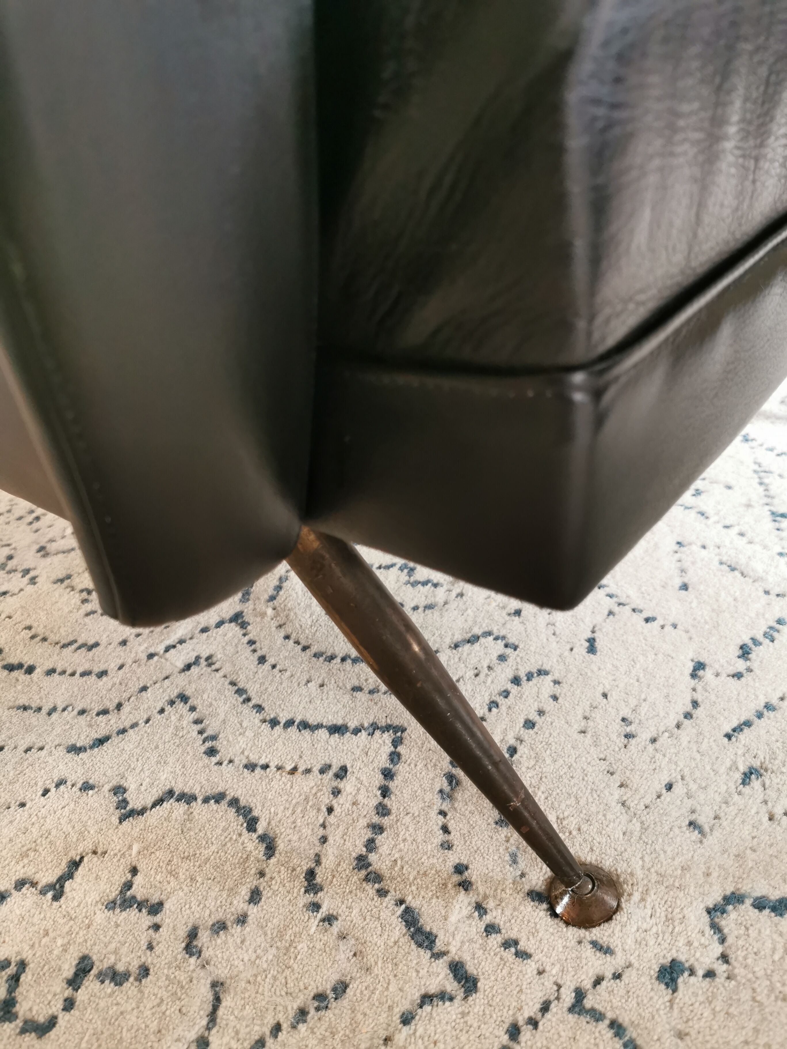 Vintage 1970s black leather armchair