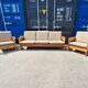 Brutalist-style bench and armchairs in 1970s pine.