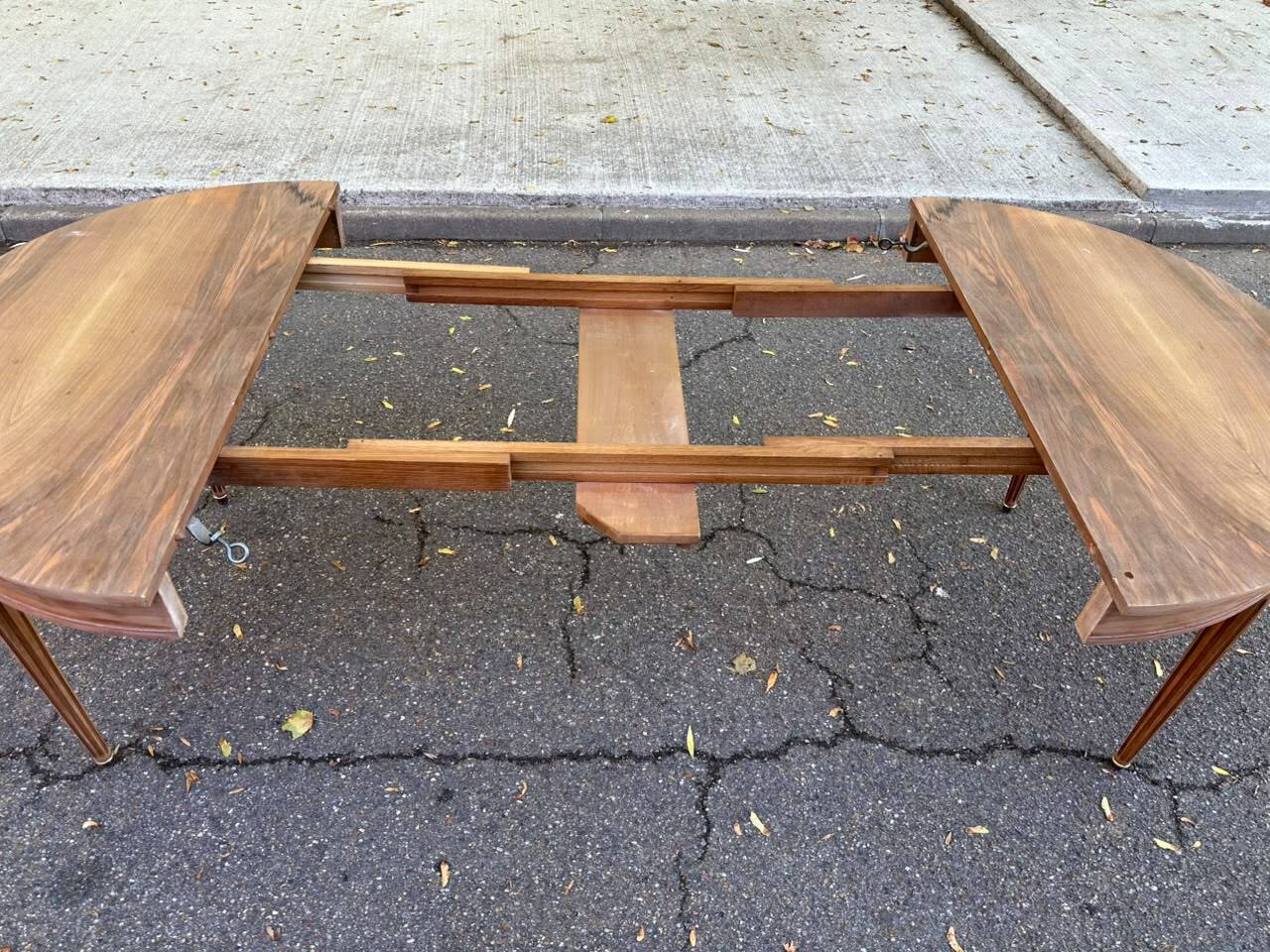 Round extendable dining table Louis XVI stripped in walnut 1960 190cm