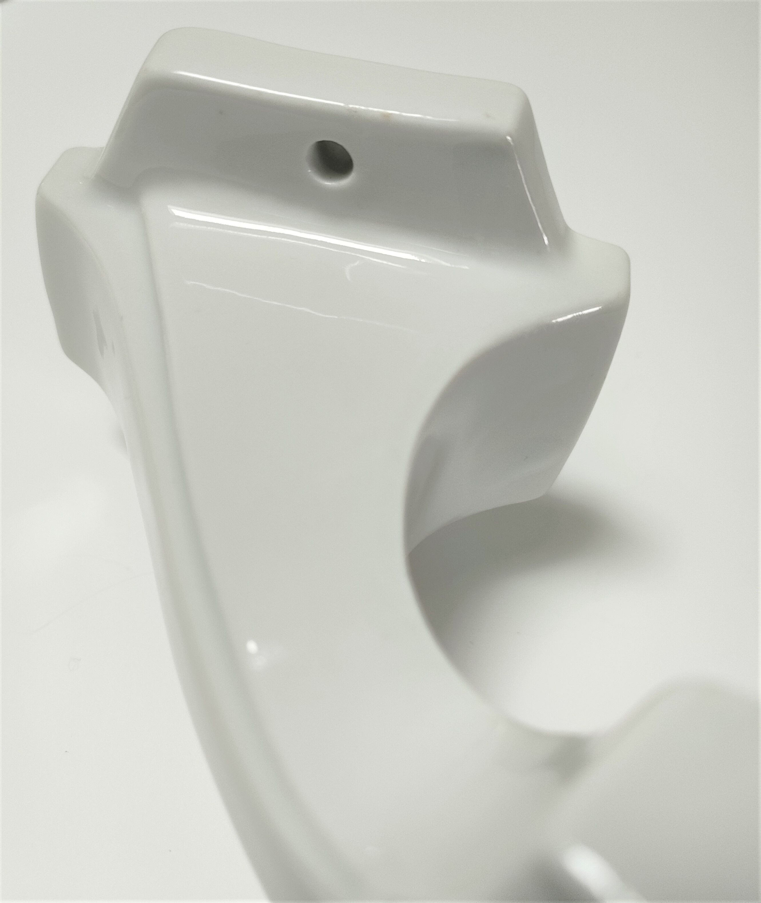Four porcelain and vintage aluminum hooks
