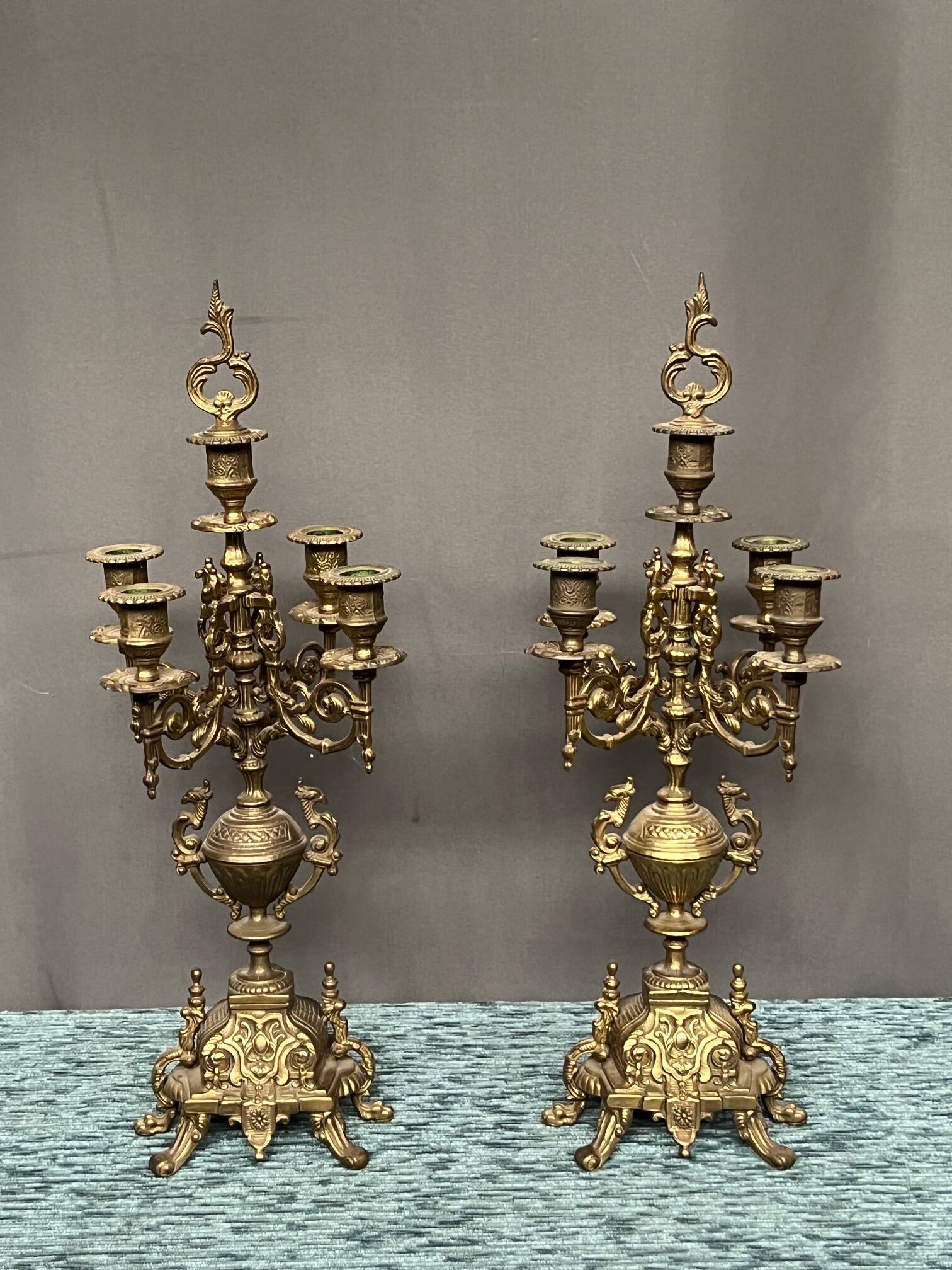 Pair of Renaissance style candlesticks. Solid bronze.