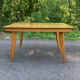 Extendable vintage table with tapered legs.