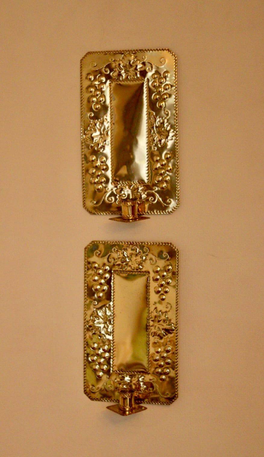 A pair of Swedish brass wall sconces from the mid-century.