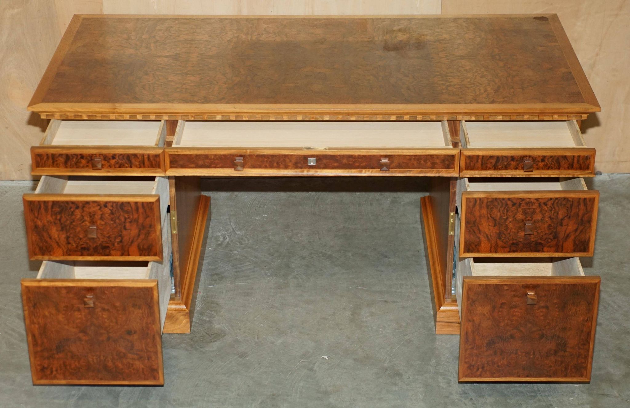David Linley Burr walnut chest of drawers for light restoration.