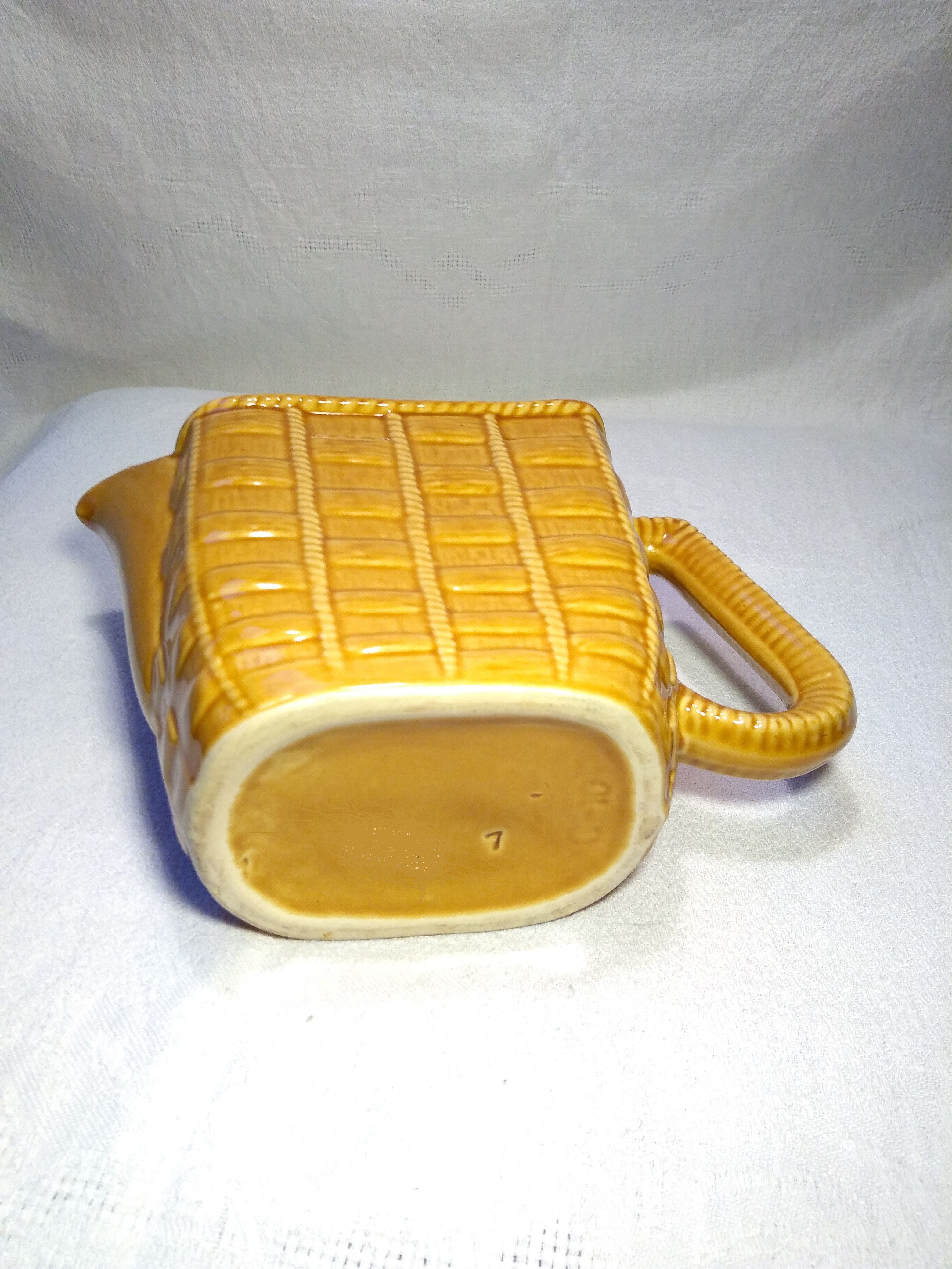 Vintage dabbling pitcher