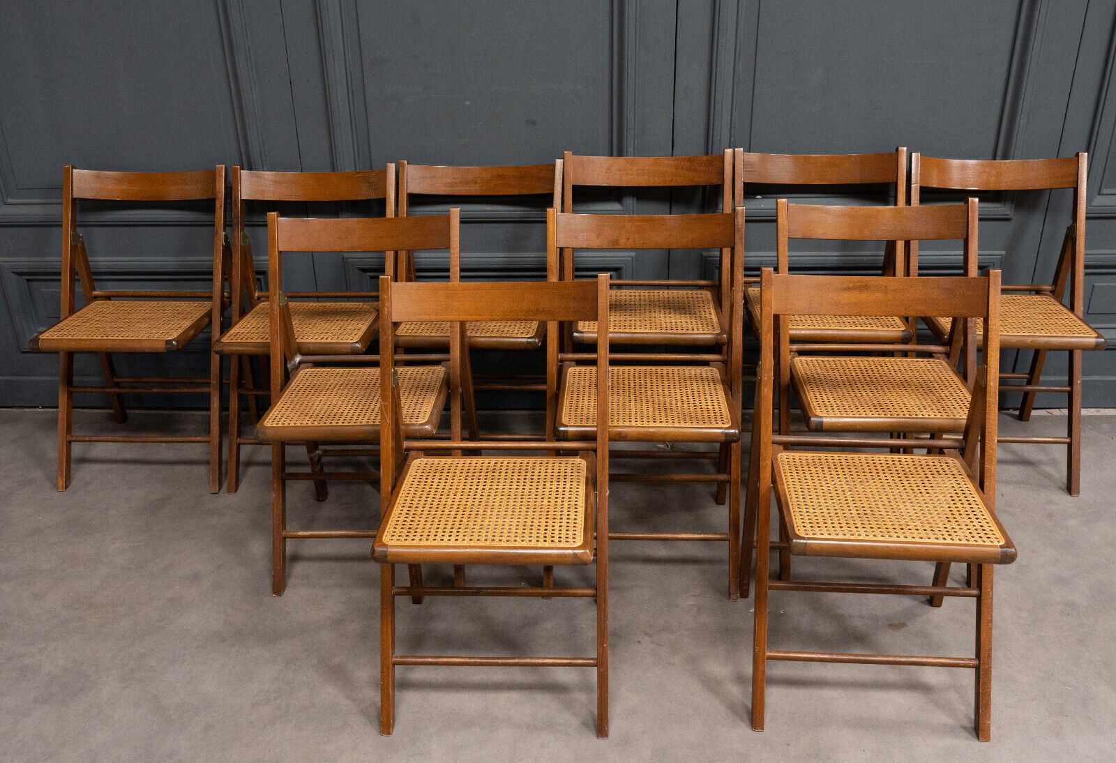 Suite of 11 folding chairs with canning 1980 wooden surround