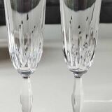 Lot 5 Large champagne flutes in cut crystal. Diamond drop/point patterns. High 20.5 cm