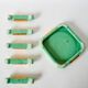 set of coasters and knife holders in mint green and gold art deco ceramic 1930