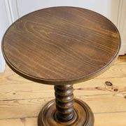 Turned wooden side table