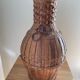 Vase en rotin vintage