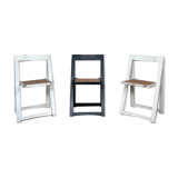 Trio of vintage folding chairs with canning and solid wood