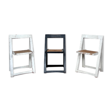 Trio of vintage folding chairs with canning and solid wood