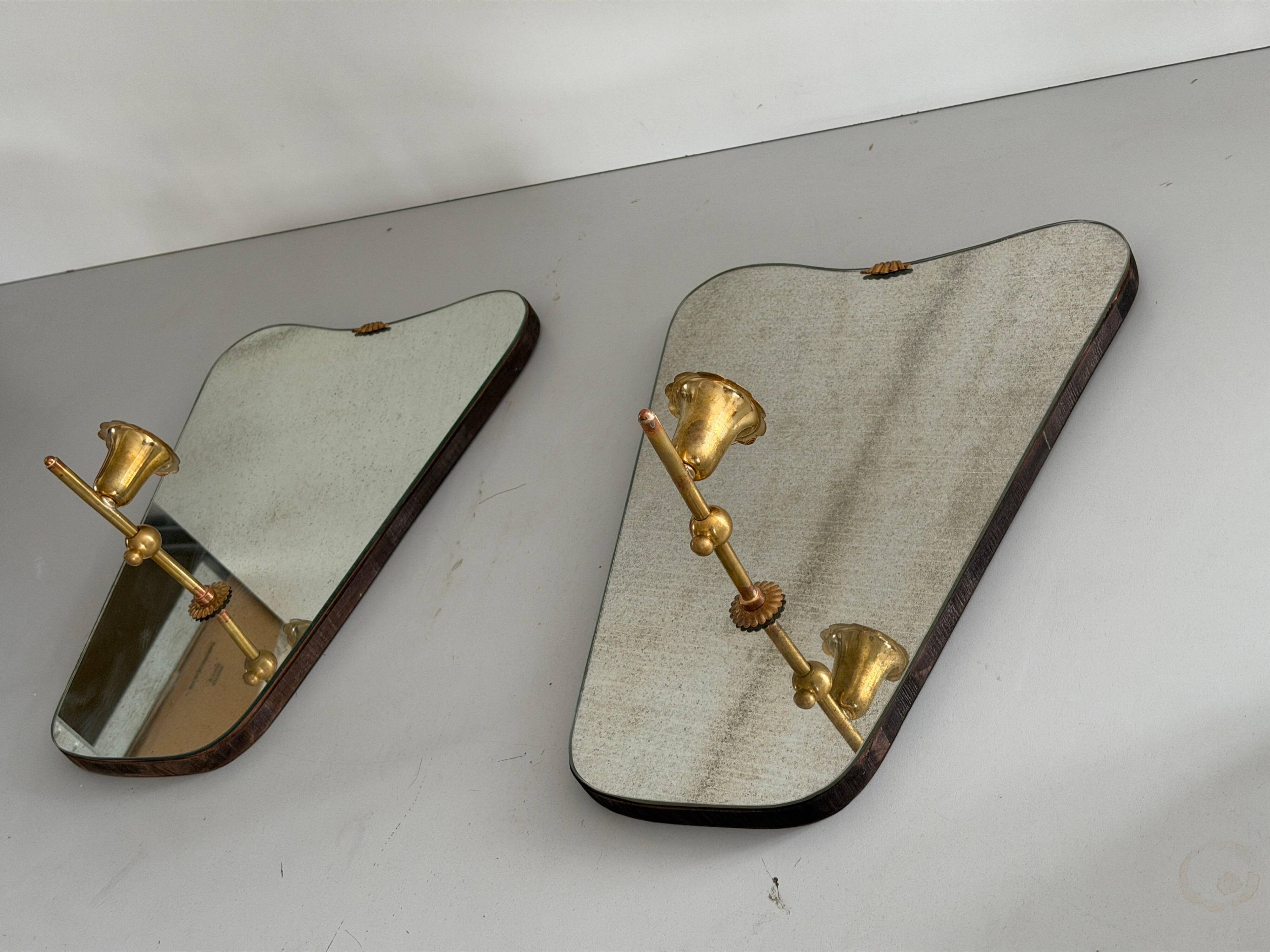 Pair of brass wall lights with mirrors, mid-20th century, Italy, 1960.