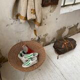 Wicker garden basket on tripod support