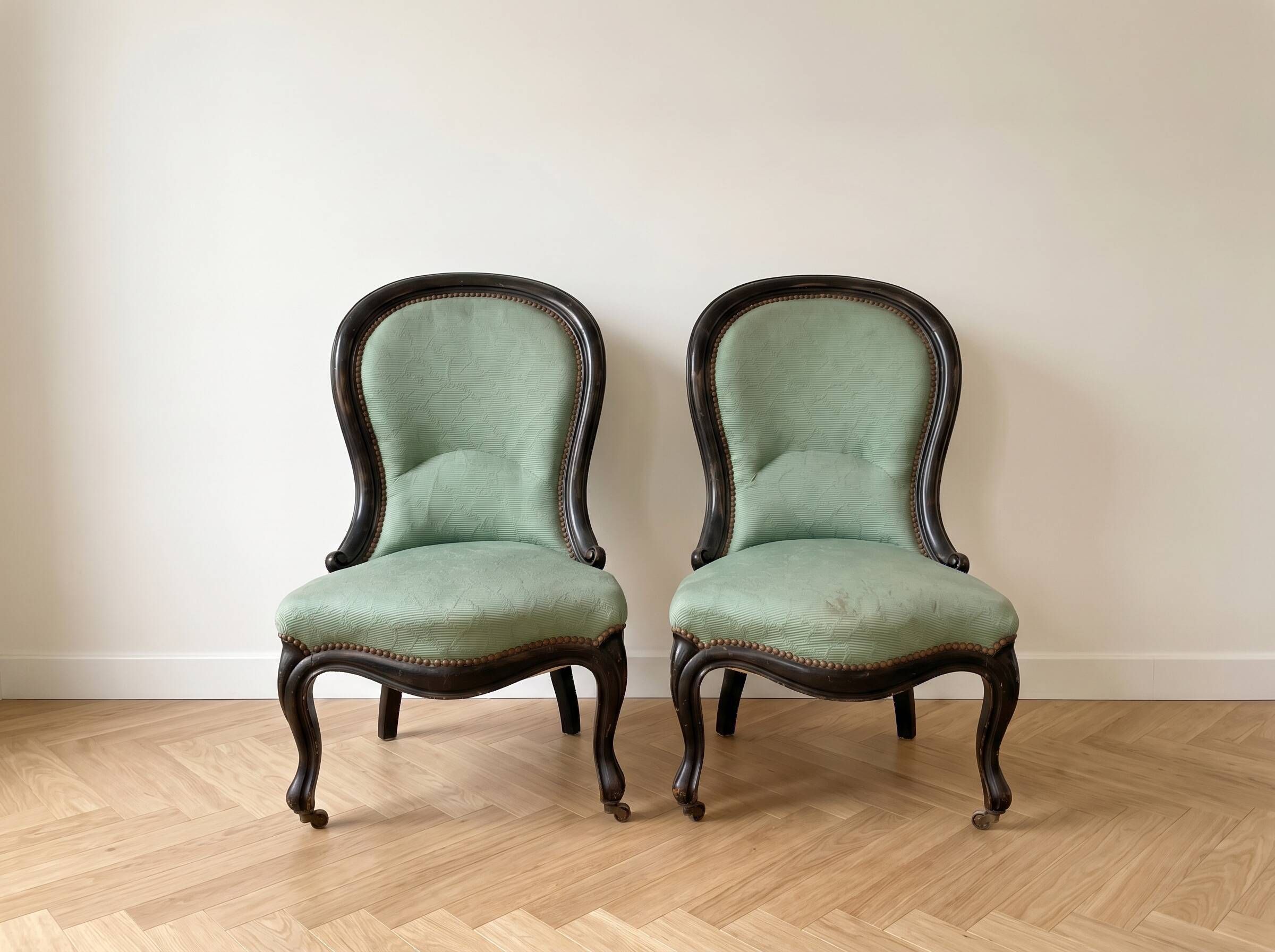 Pair of Louis XV armchairs in wood and green fabric.