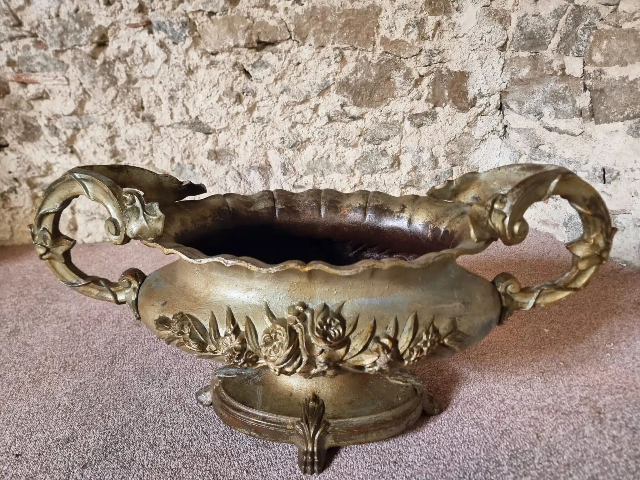 Large antique cast iron planter on a stand, France, circa 1900.