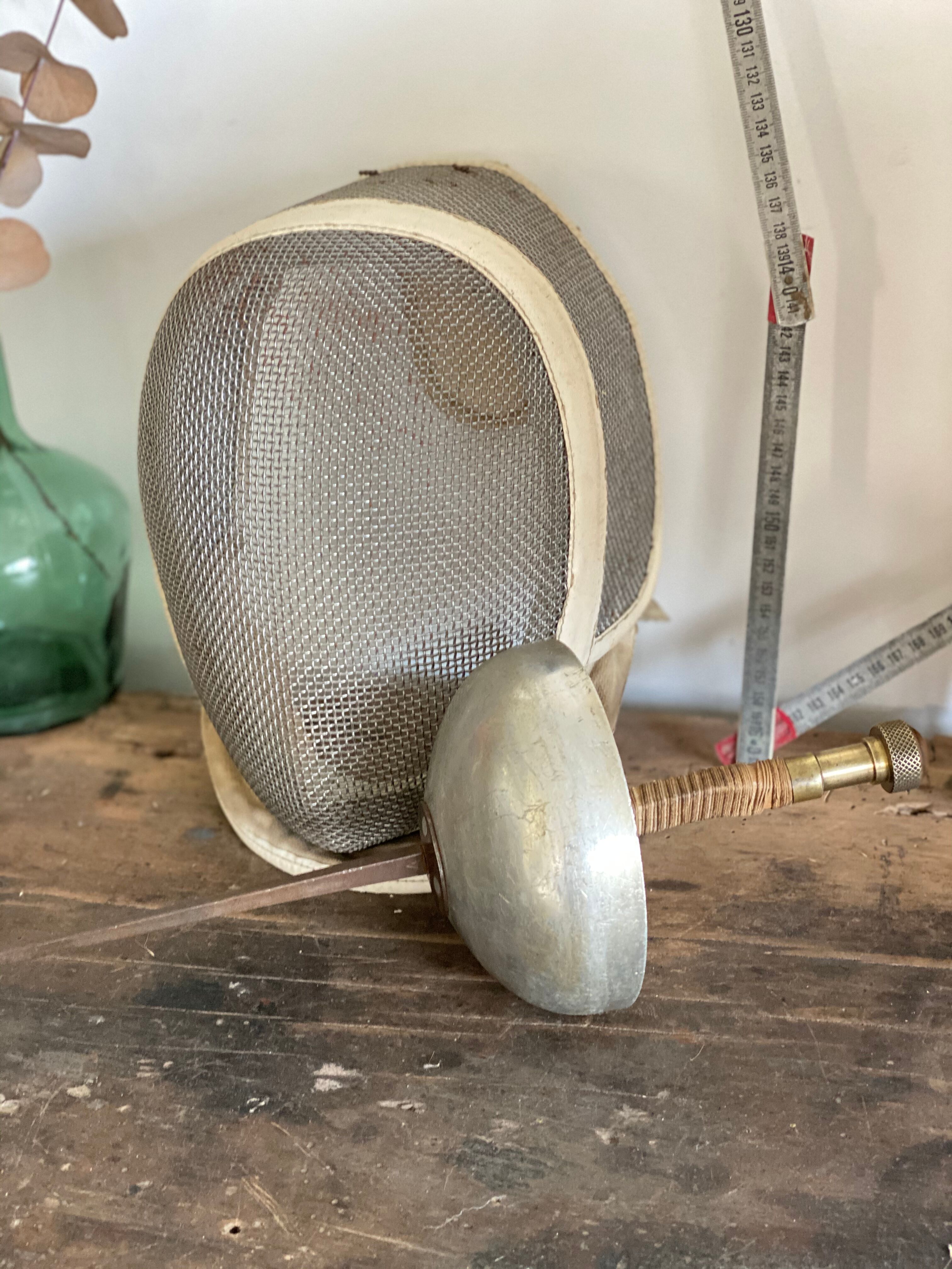 Old fencing mask set and its foil